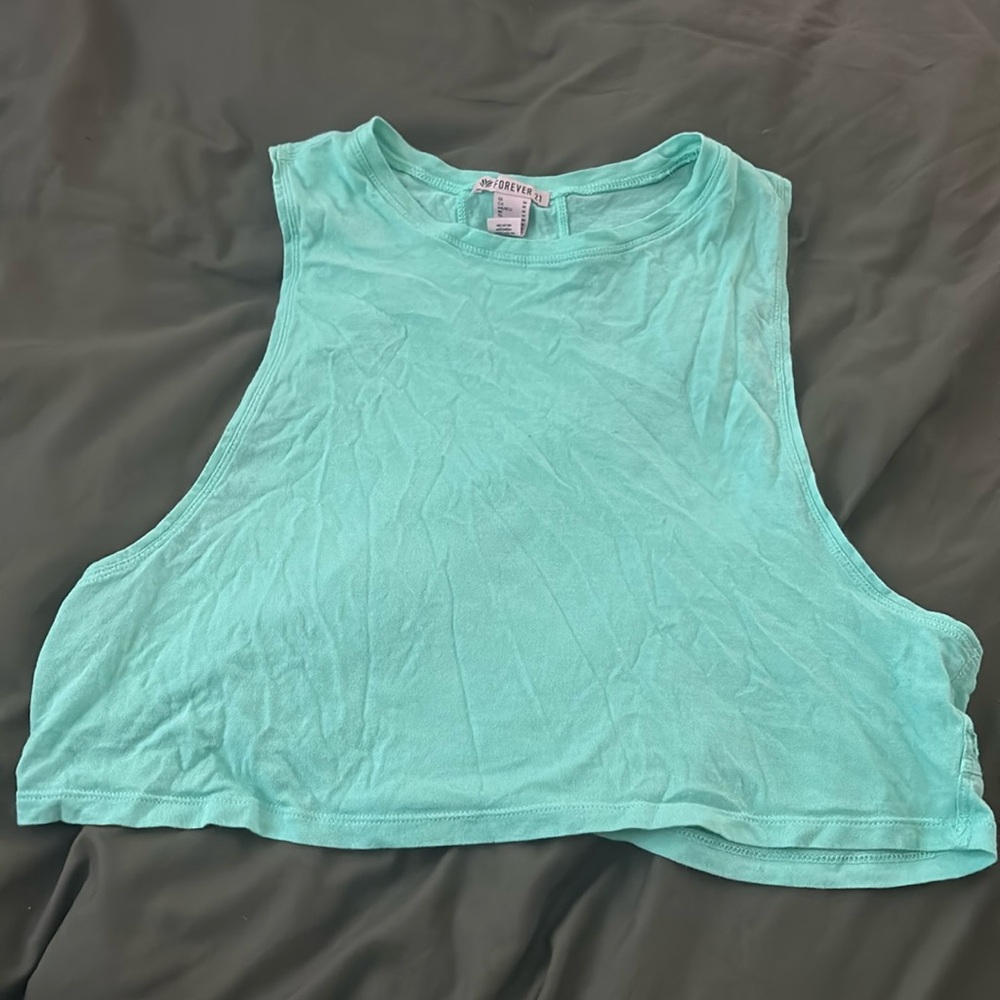 Workout tank with small hole